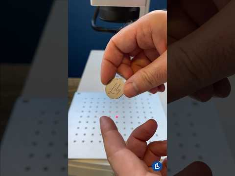 Laser engraving on metal. Customised steel medal
