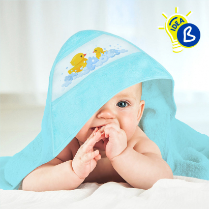 Baby towel with cap outlet